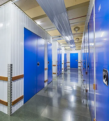 Space Valet Sewri - wide aisle with blue lockers
