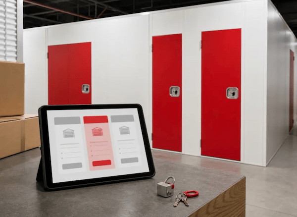 Storage units and digital booking display at Wadaya Self Storage in Tubli