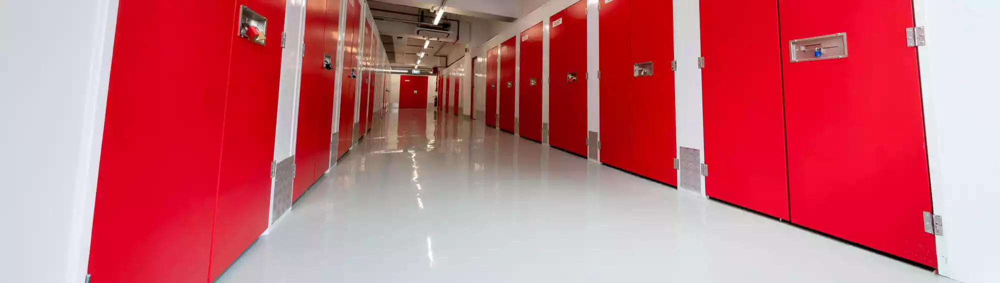 RedBox Mini Storage Tuen Mun - Red storage unit corridor
